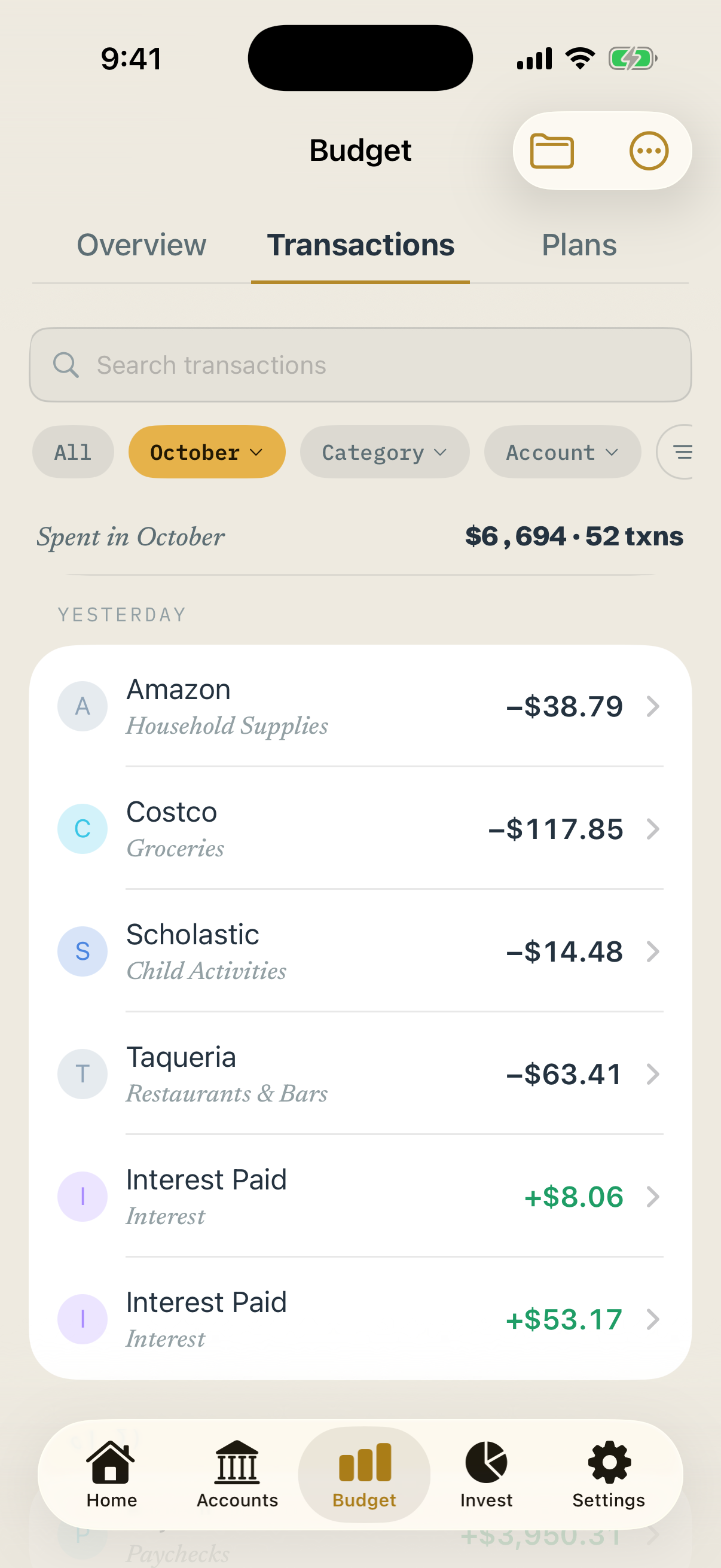 Transactions list for October, $6,694 spent across 52 transactions, with merchants, categories and amounts.
